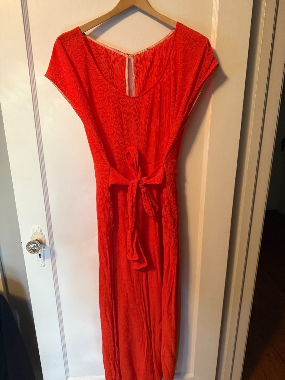 Anthropologie red tie waist jumpsuit. Tags have been removed.